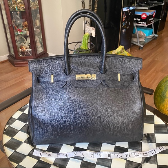 Handbags - Black tote gold hardware Togo leather. Pebble leather. 35cm